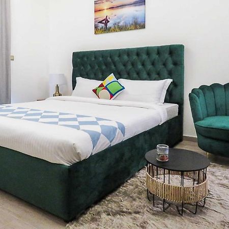 OYO 860 Studio Apartment, Maya Tower 4, Jumeirah Village Triangle Dubai Bagian luar foto