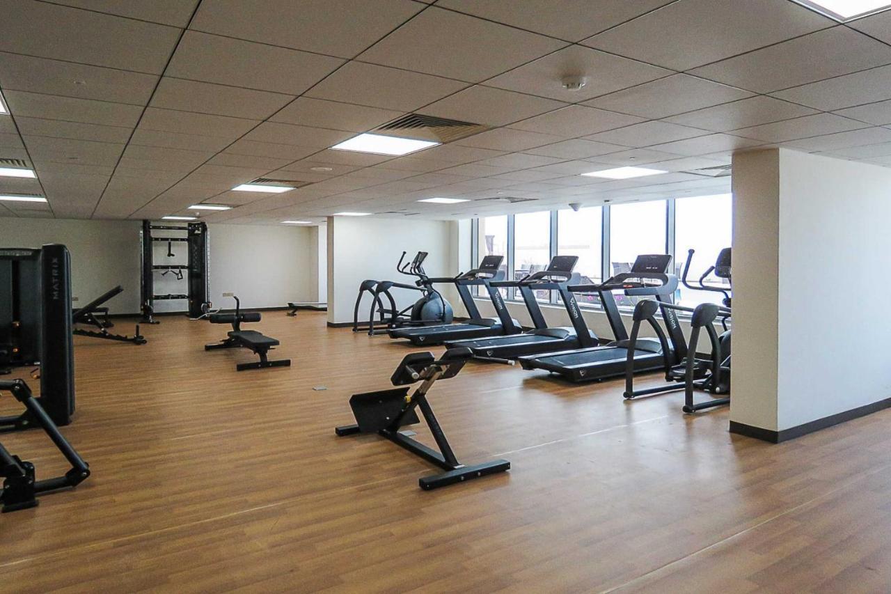 OYO 860 Studio Apartment, Maya Tower 4, Jumeirah Village Triangle Dubai Bagian luar foto