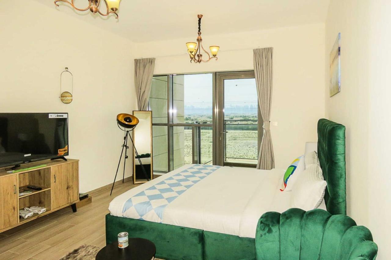 OYO 860 Studio Apartment, Maya Tower 4, Jumeirah Village Triangle Dubai Bagian luar foto