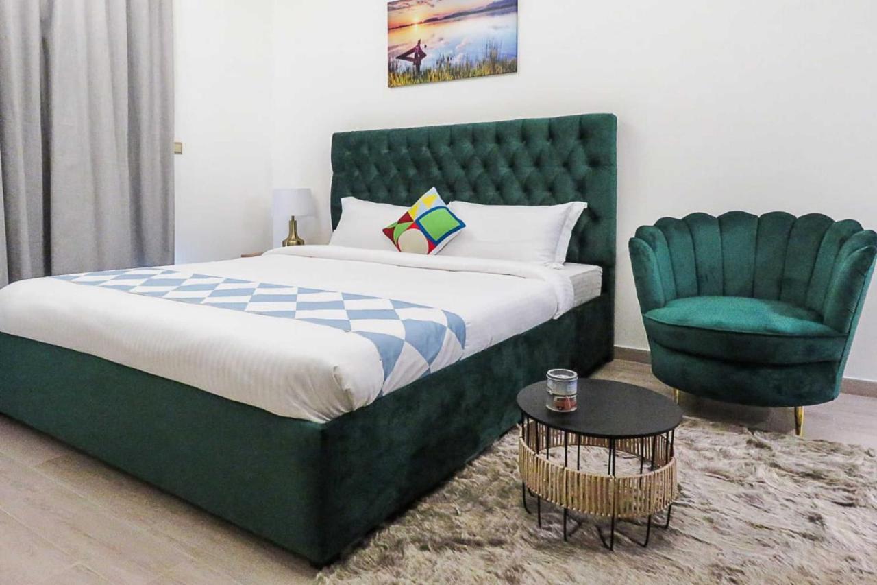 OYO 860 Studio Apartment, Maya Tower 4, Jumeirah Village Triangle Dubai Bagian luar foto