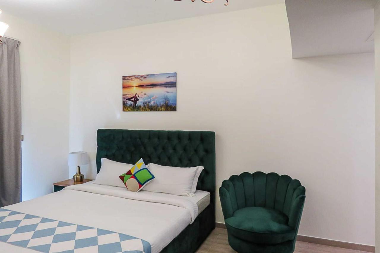 OYO 860 Studio Apartment, Maya Tower 4, Jumeirah Village Triangle Dubai Bagian luar foto
