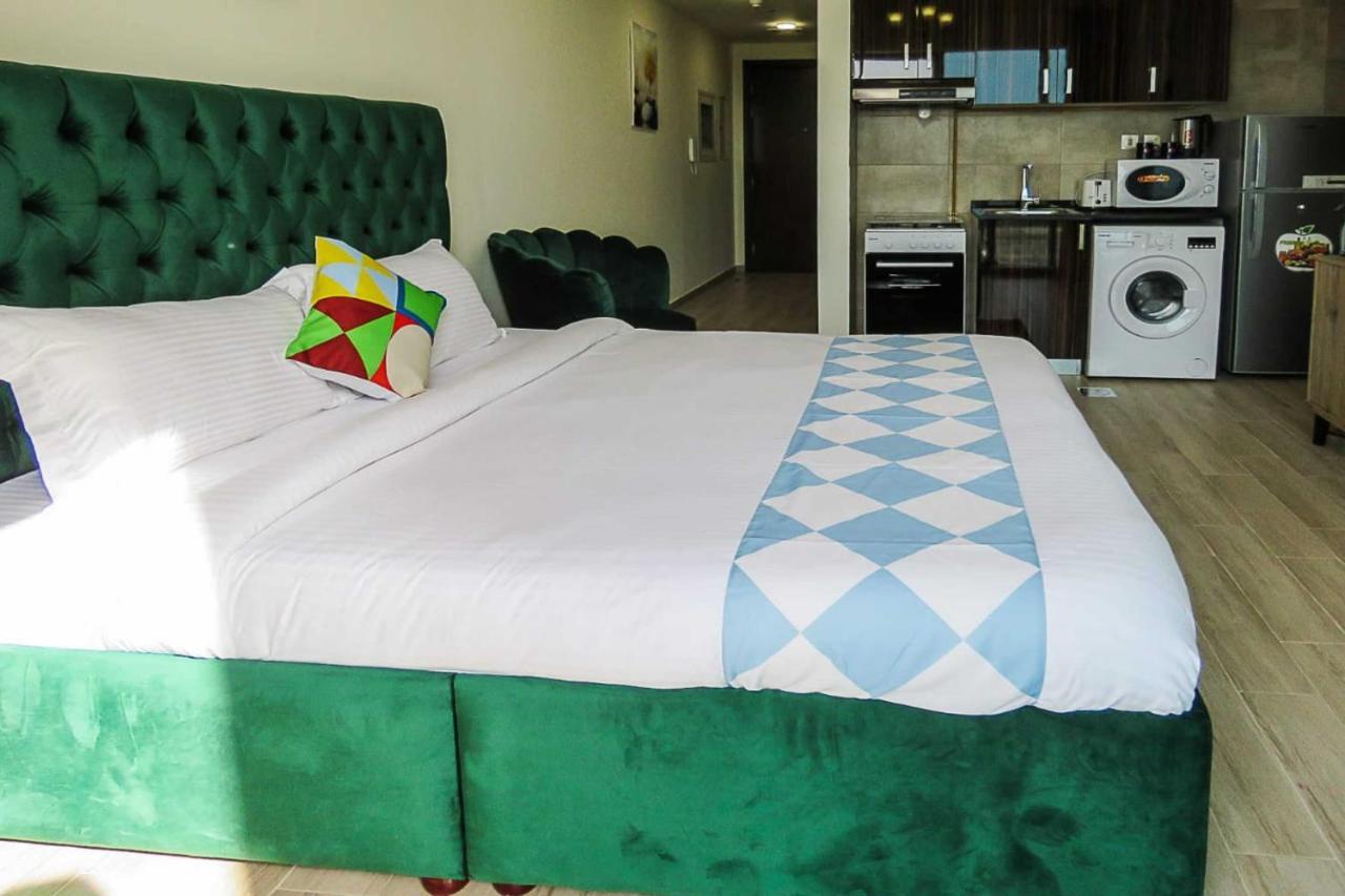 OYO 860 Studio Apartment, Maya Tower 4, Jumeirah Village Triangle Dubai Bagian luar foto