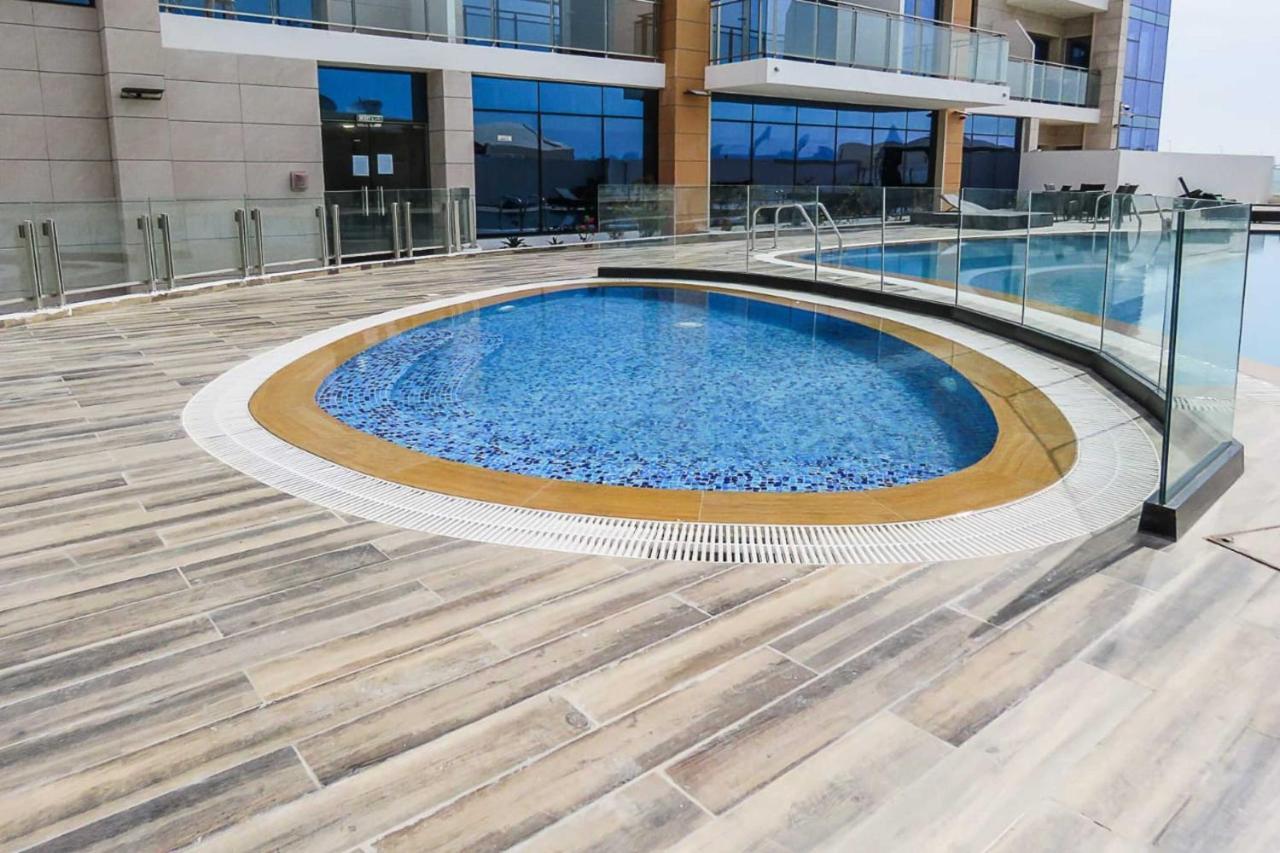 OYO 860 Studio Apartment, Maya Tower 4, Jumeirah Village Triangle Dubai Bagian luar foto